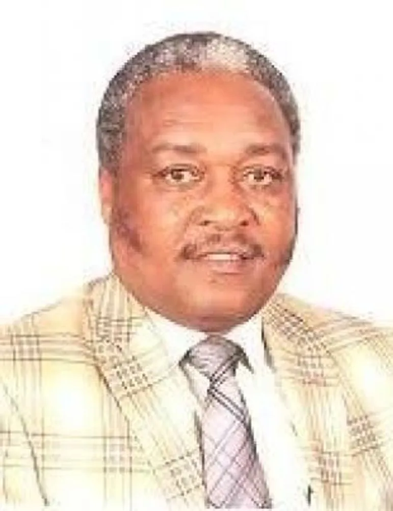 Portrait of H.E. Amb. Hon. Kubai Iringo